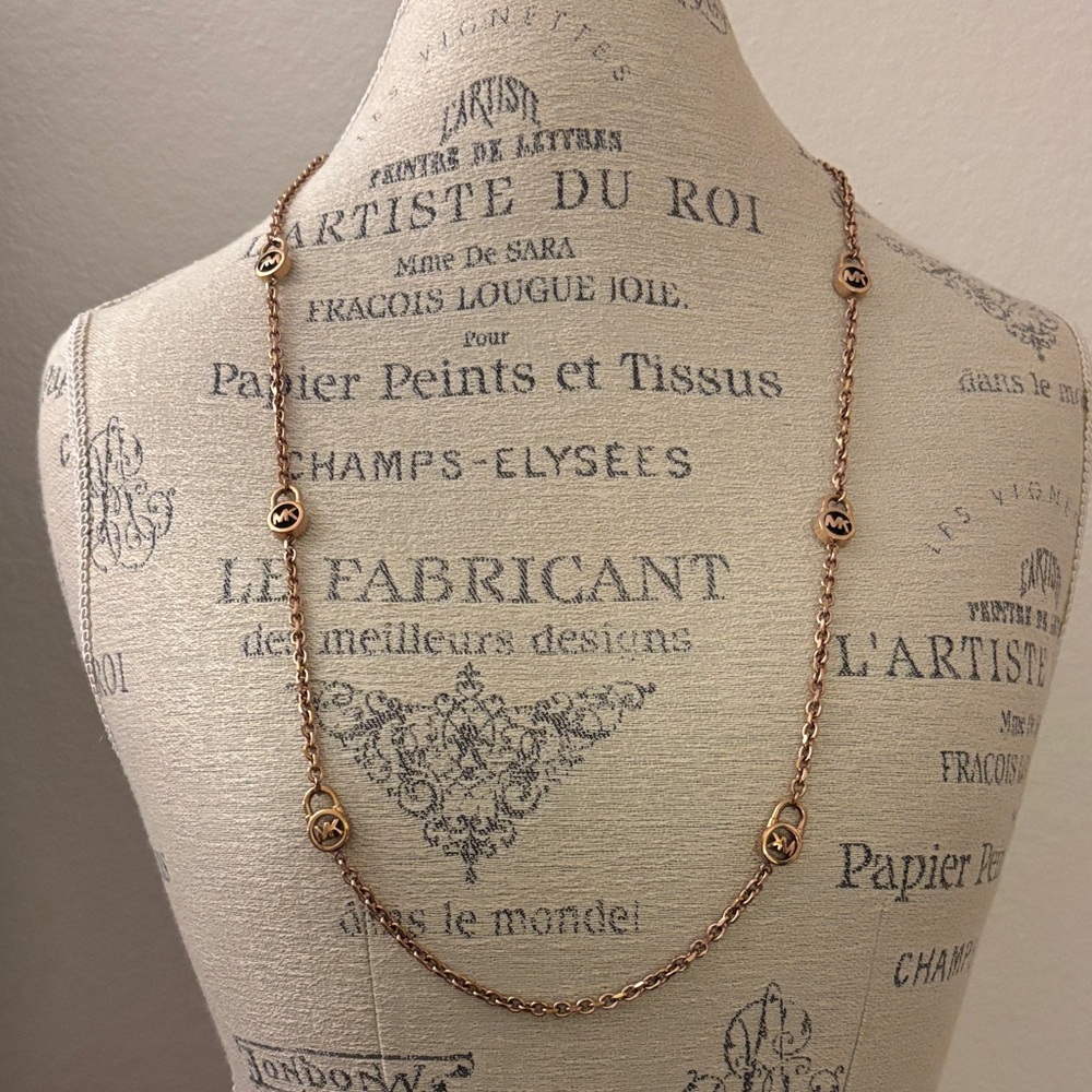 Michael Kors Long Rose Gold Logo Medallion Necklace